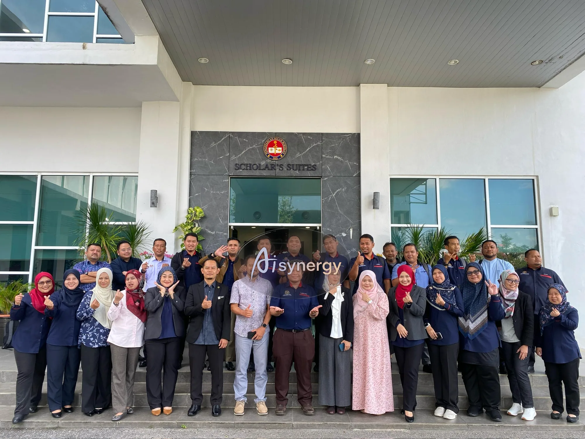 A full cohort of Malaysian government officers with the AISynergy trainer at the close of a training programme
