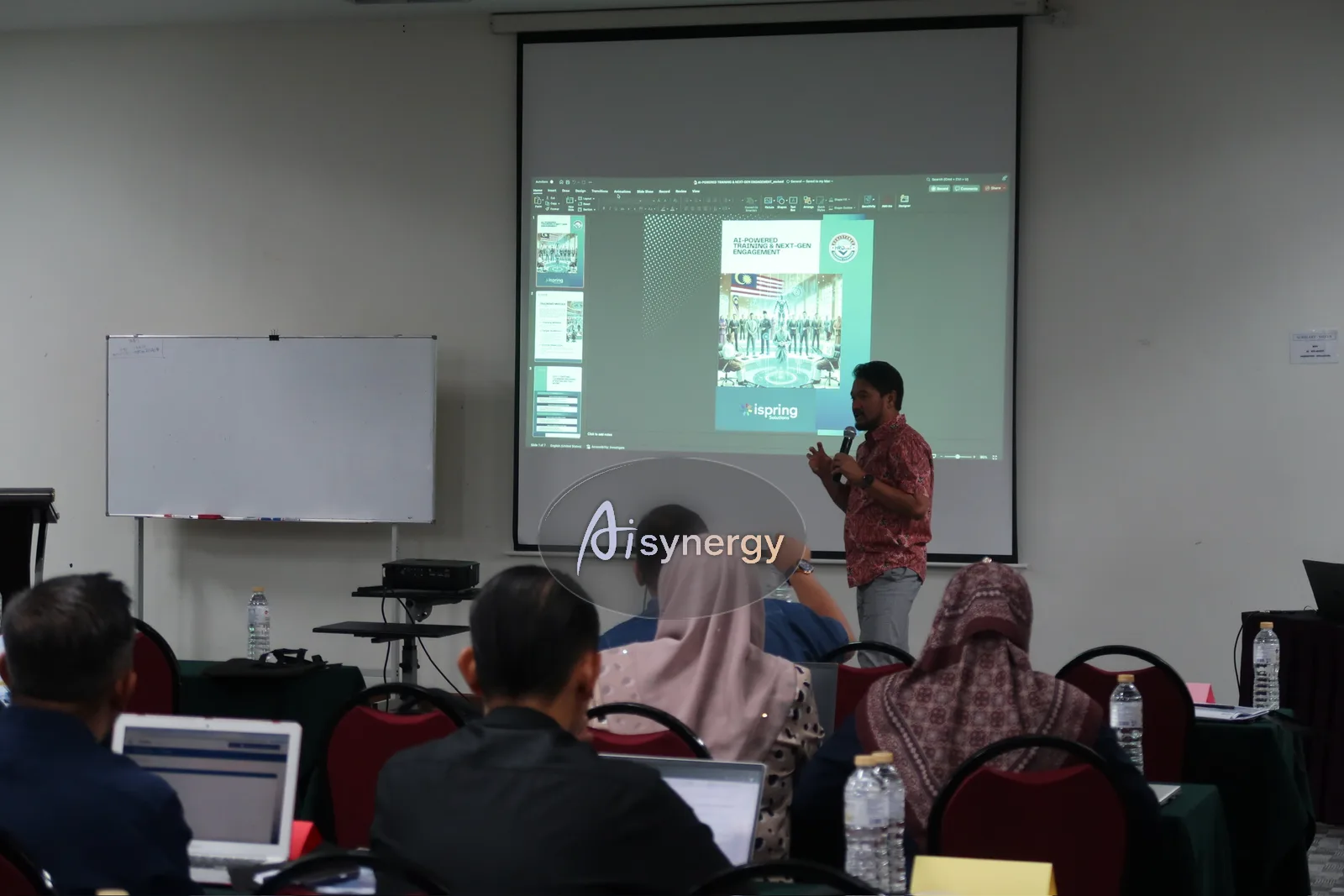 AISynergy trainer presenting an AI training session to government officers